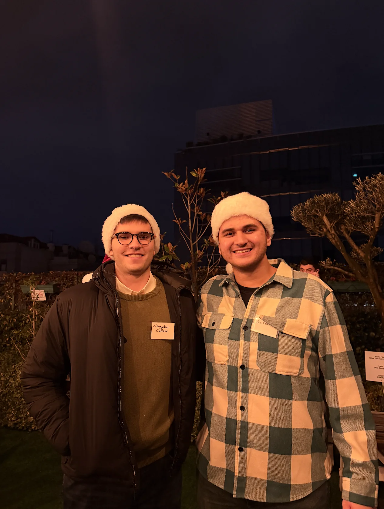 Cengizhan and Baris with their Santa hats at the e2vc event